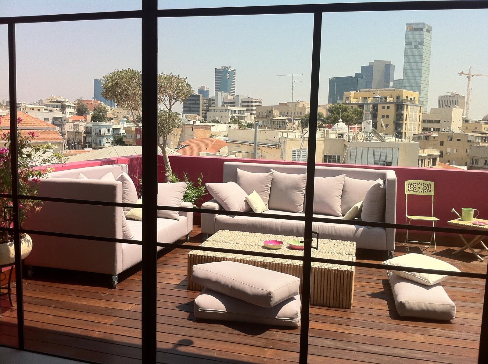 Outdoor lounge seating on the upper terrace of the Shefer 19 duplex penthouse